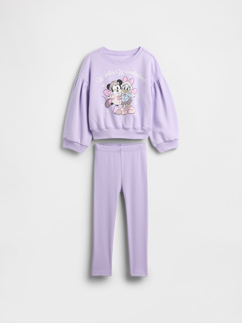 Lila Kinder-Loungewear-Set mit einem langärmligen Oberteil mit Puffärmeln und einem Grafikdruck, kombiniert mit passenden Leggings.