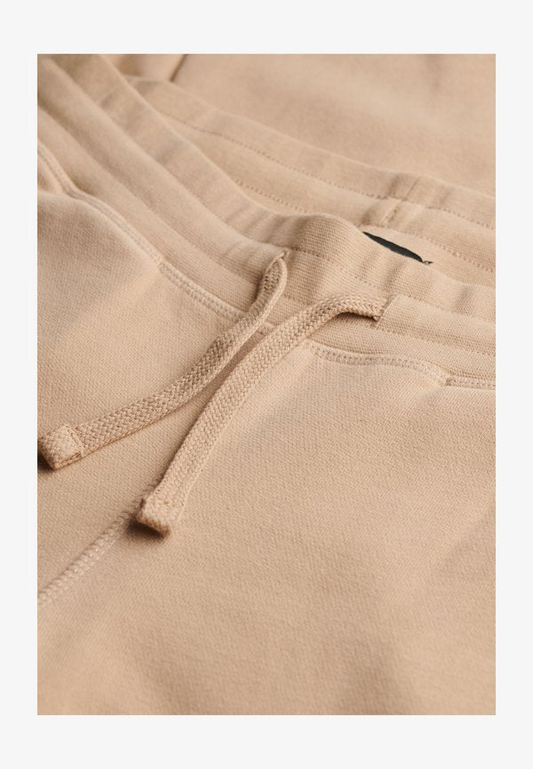 Superdry & Co STUDIOS JOGGERS - Tracksuit bottoms - light taupe