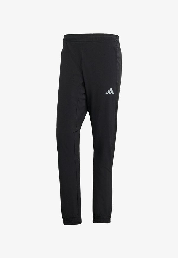 adidas Performance TECH APP - Tracksuit bottoms - black   carbon