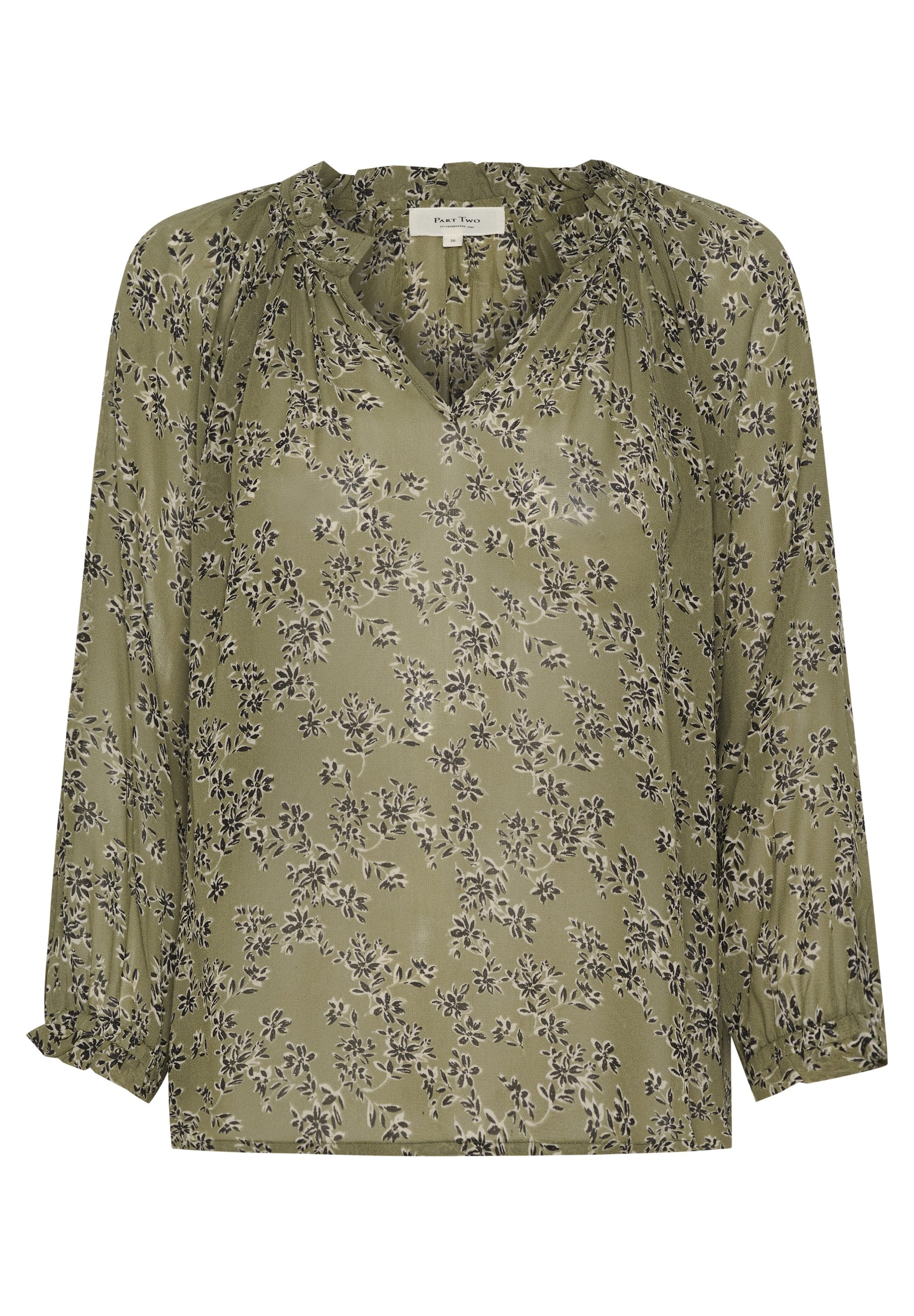Olivgrüne Bluse mit langen Ärmeln, V-Ausschnitt, gerafften Details und dunklem Blumenmuster. Hergestellt aus einem glatten, leichten Stoff.
