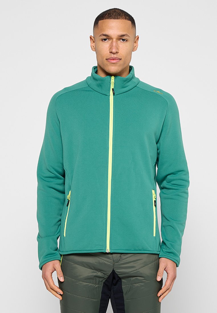 Grüne Fleecejacke mit hohem Kragen, durchgehendem Reißverschluss und gelben Akzenten. Mit Seitentaschen und entspanntem Schnitt. Glatte Textur.