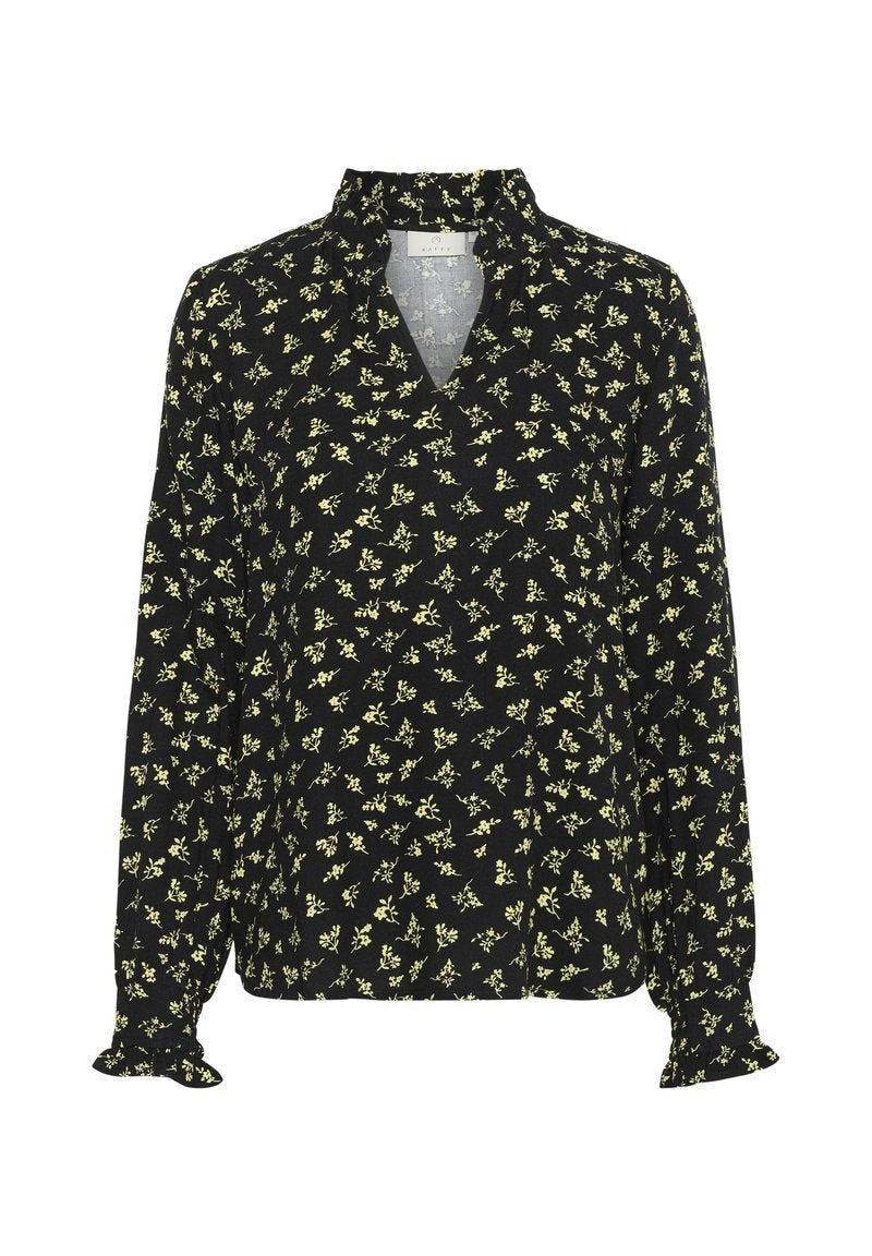 Schwarze langärmelige Bluse mit kleinem gelbem Blumenmuster, einem gerafften hohen Kragen und einer dezenten Rüschenverzierung an den Manschetten.