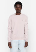 Helles rosa Sweatshirt mit langen Ärmeln, gerippten Bündchen und Saum. Verfügt über ein kleines Logo auf der linken Brust und hat eine lockere Passform.