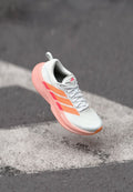 adidas Performance SUPERNOVA GLIDE W - Road running shoes - footwear white/beam orange/lucid red