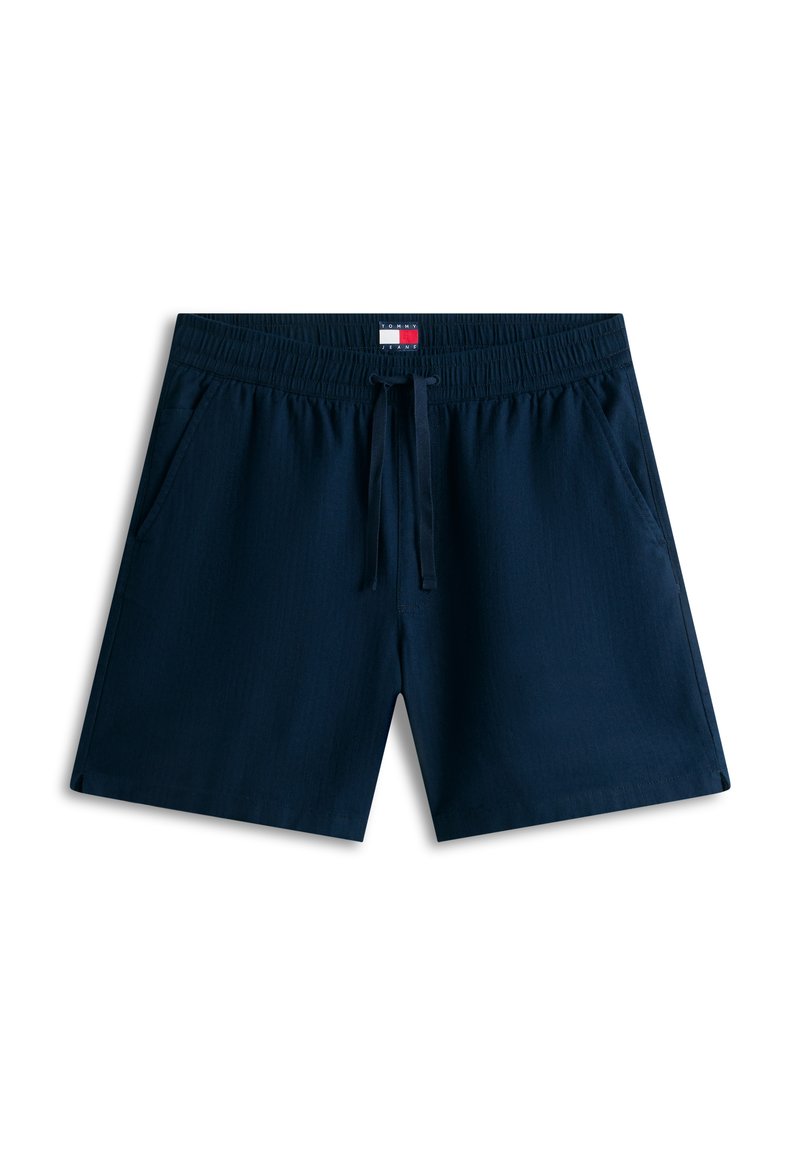 Herren-Schwimmshorts in Marineblau mit elastischem Bund, Kordelzug, Seitentaschen und Tommy Jeans-Logo auf dem inneren Bund.