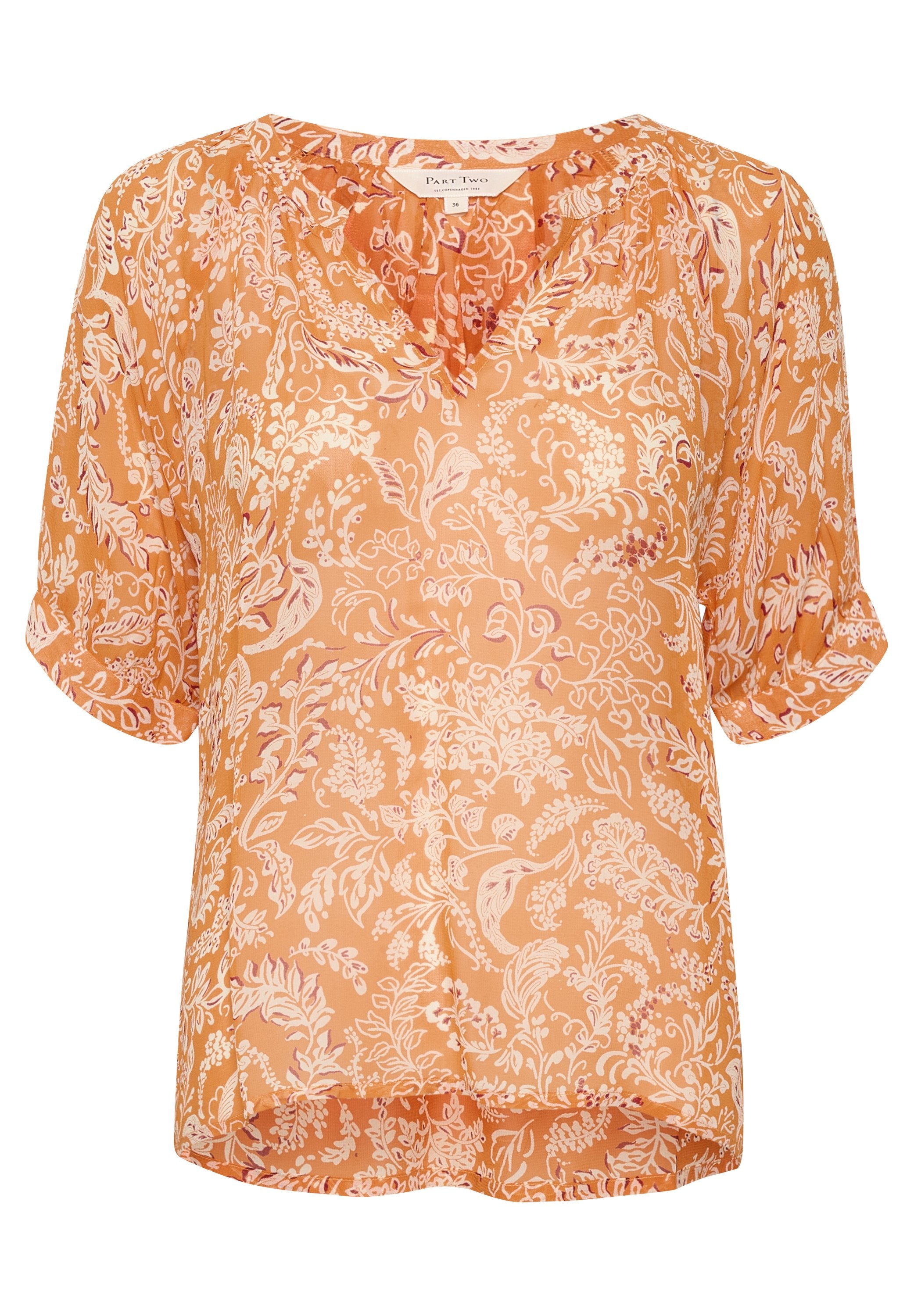 Orange-blumiges Oberteil aus leichtem Stoff. Mit V-Ausschnitt, kurzen Ärmeln und einem ganzflächigen Blumenmuster in Pink und Weiß.