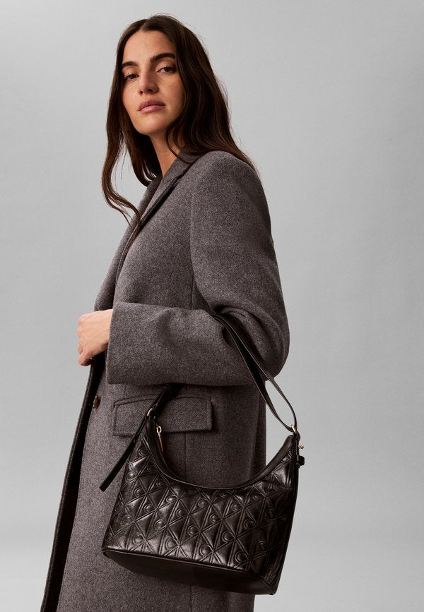 Calvin Klein DEBOSSED SHOULDER - Cross body bag - black