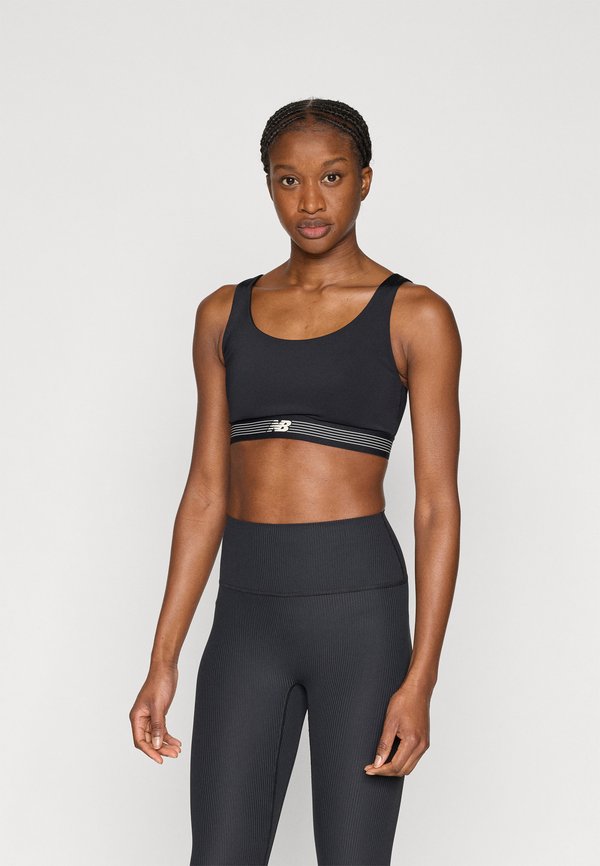 New Balance AC TRAIN BRA - Medium support sports bra - black
