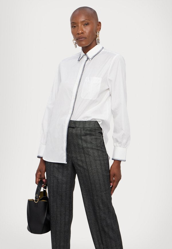 REMAIN STRIPED SLIM PANTS