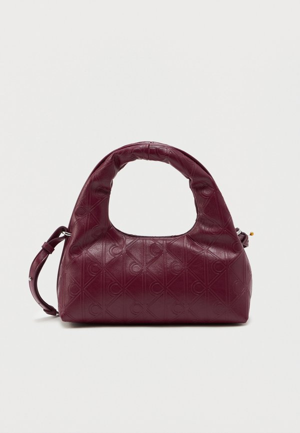 Calvin Klein EMBLEM PUFFER BAG WITH STRAP - Cross body bag - alluring pink