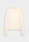 Cremefarbener Sweatshirt mit langen Ärmeln, verziert mit verstreuten metallic Nieten, gerippten Manschetten und einem runden Ausschnitt.