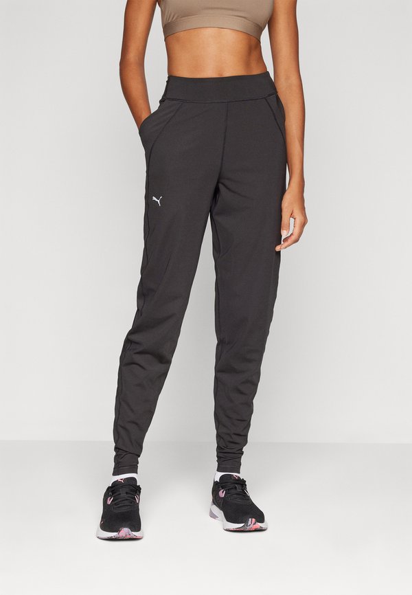 Puma MODEST JOGGER - Tracksuit bottoms - black