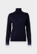 Marinefarbener Rollkragenpullover aus weichem Material, mit langen Ärmeln und denimähnlichen Akzenten an den Bündchen, in taillierter Passform.
