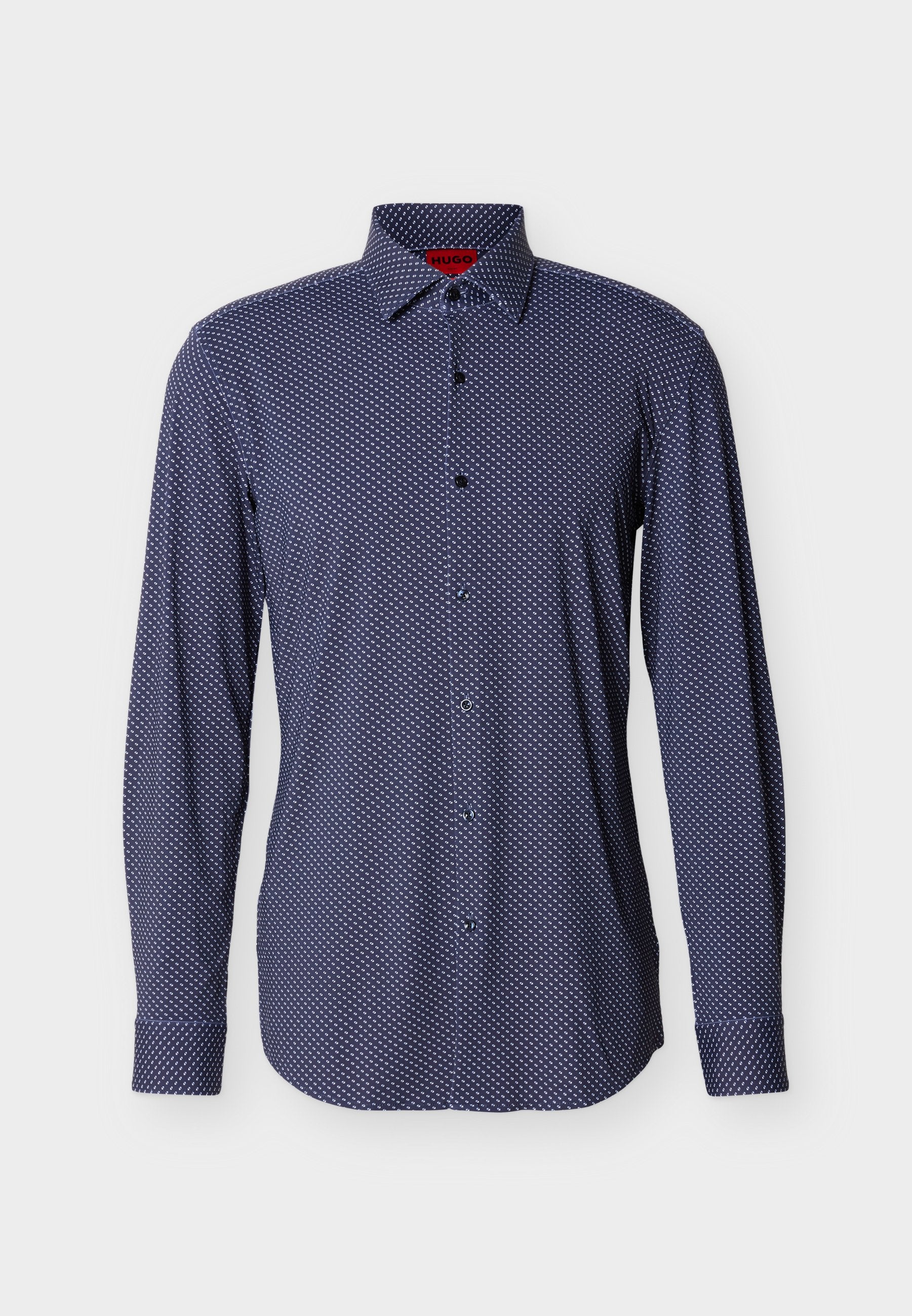 Marineblaue langärmlige Hemdbluse mit kleinem weißem Rautenmuster, weichem Stoff, geknöpften Manschetten und klassischem Kragen.