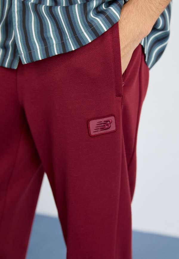 New Balance POST SEASON TRACK PANT