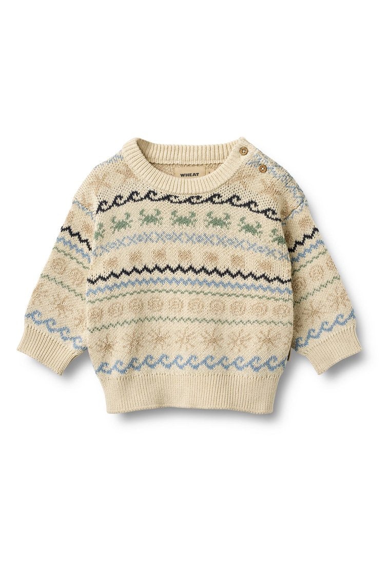 Gestrickter Pullover in Creme mit dekorativem Muster in Grün-, Blau- und Marineakzenten; Rundhalsausschnitt und seitliches Knopfdetail.