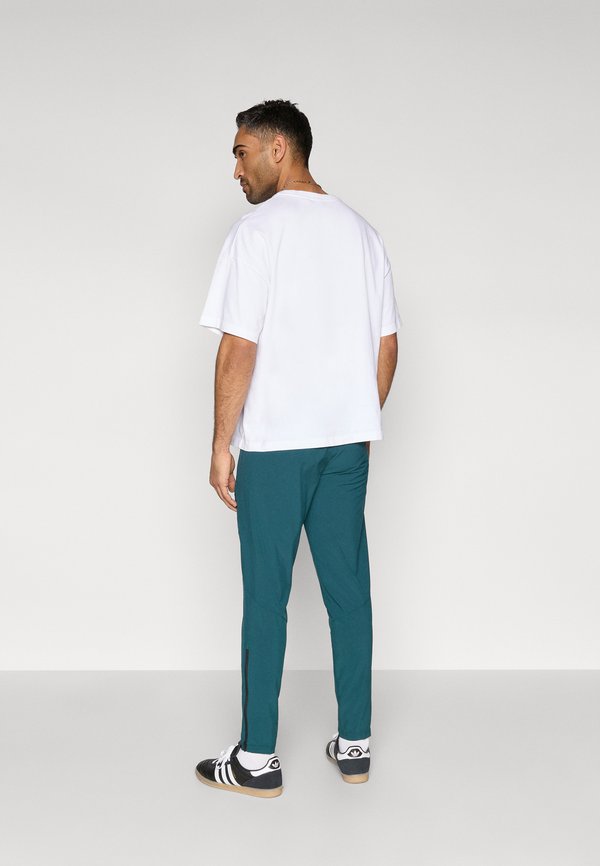 adidas Performance MEXICO TIRO TRAVEL PANTS