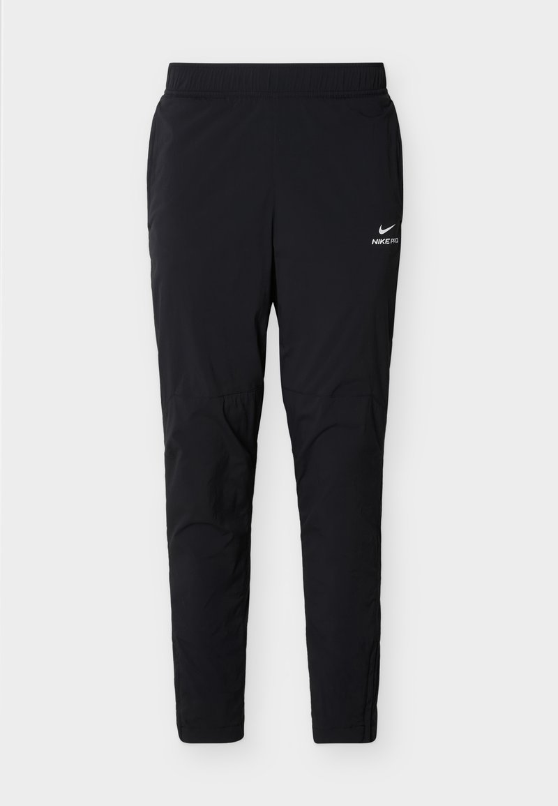 Schwarze Nike Pro Sporthose mit elastischem Bund und schlanken, zulaufenden Beinen, mit kleinem weißem Logo auf dem oberen Oberschenkel.