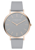 Runde Uhr mit einem grauen Zifferblatt und minimalistischen roségoldenen Stundenmarkierungen. Verfügt über ein weiches graues Lederarmband und einen eleganten vergoldeten Gehäuserand.
