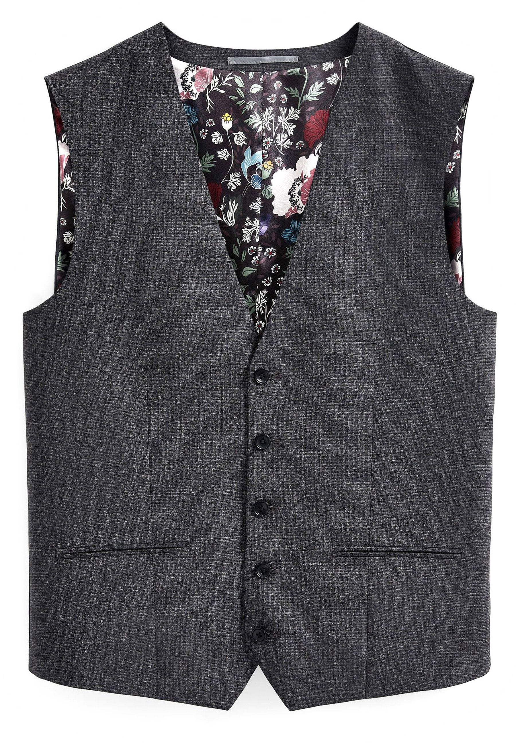 Grauer Stoffweste mit strukturiertem Finish, ausgestattet mit einem blumengemusterten Futter, fünf schwarzen Knöpfen und zwei vorderen Taschen.
