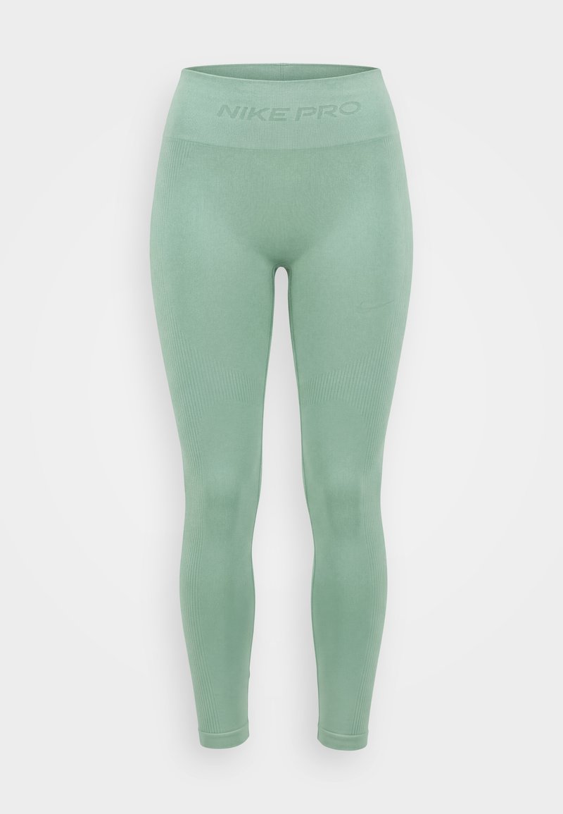 Hellgrüne Nike Pro nahtlose Leggings mit gerippter Struktur und hohem Bund mit "NIKE PRO"-Schriftzug.