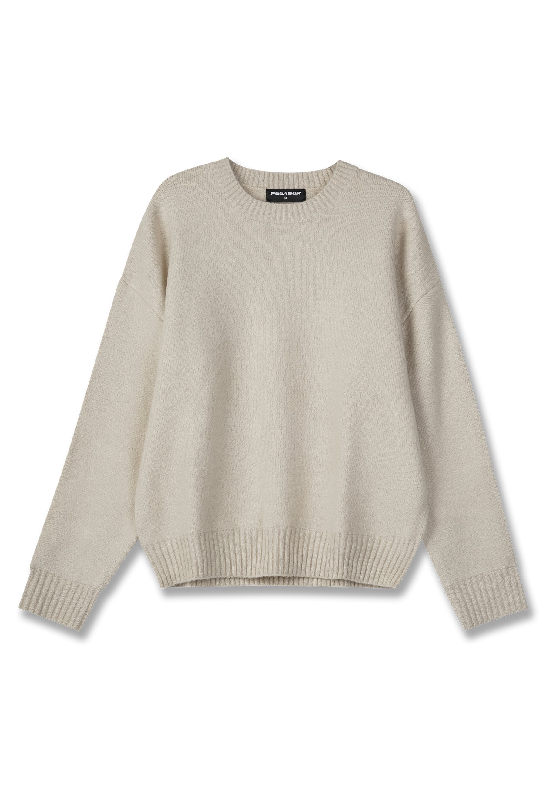 Cremfarbener Strickpullover mit Rundhalsausschnitt, gerippten Bündchen und Saum. Hat eine lockere Passform und eine weiche Textur, ideal für die Freizeit.