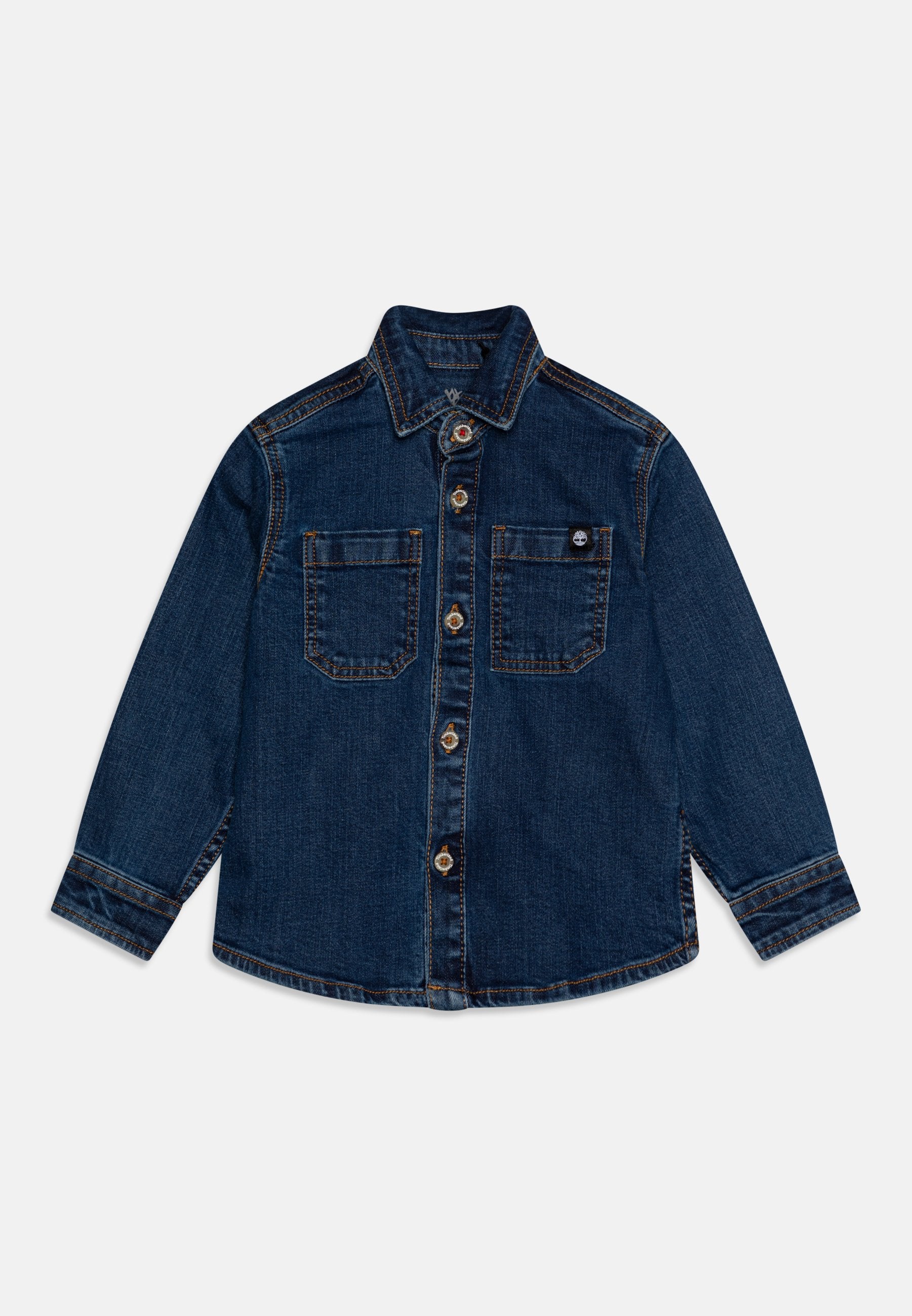 Dunkelblaue Jeansjacke mit spitzem Kragen, Knopfverschluss, zwei Brusttaschen und kontrastierenden Nähten.