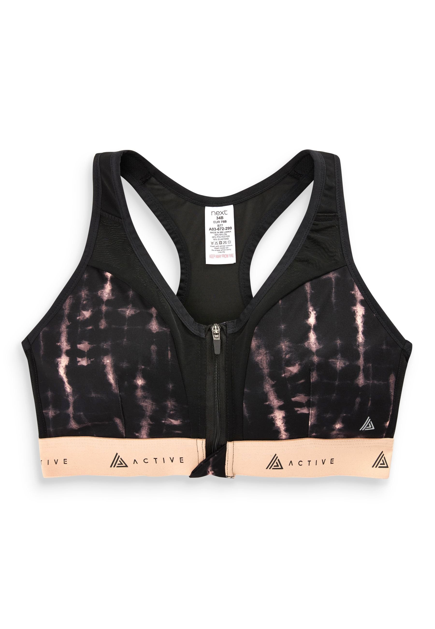 Schwarzer und pinkfarbener Sport-BH mit Reißverschluss vorne, der ein Batikmuster aufweist, aktive Markenkennzeichnung am Band und ein Racerback-Design.