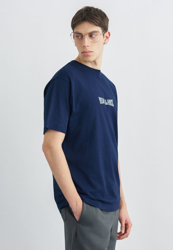 New Balance WAVEY - Print T-shirt - navy
