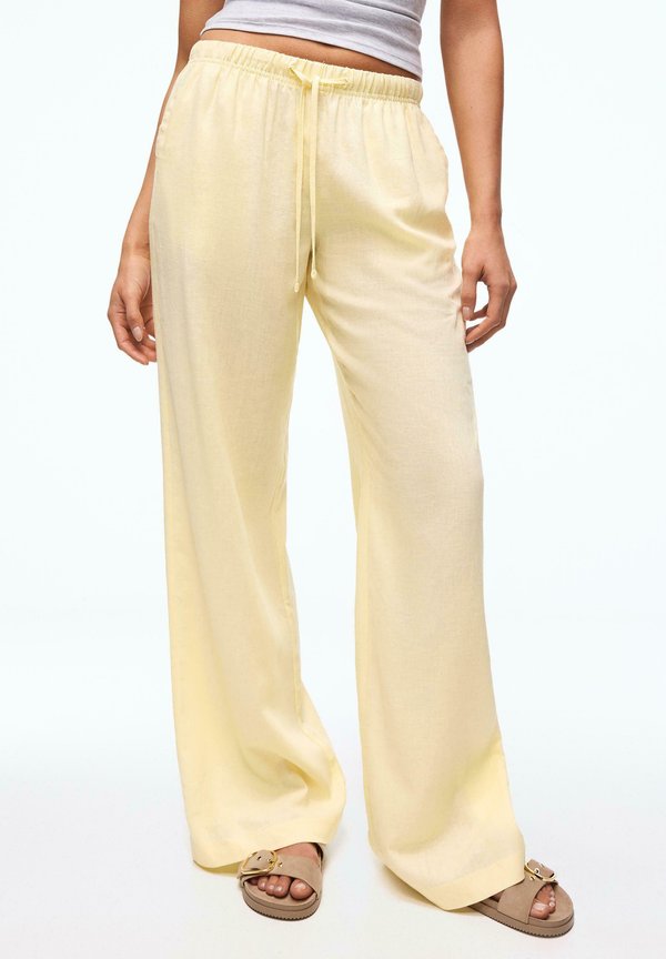 Bershka Trousers - yellow