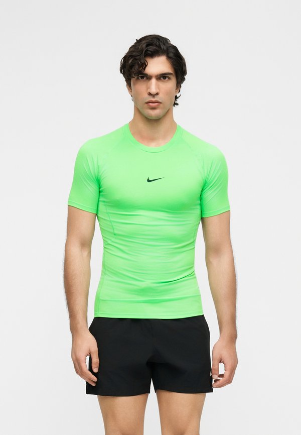 Nike Performance TIGHT - Undershirt - green strike/black