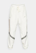 Nike Performance WOVEN ICON PANT STARTING FIVE - Tracksuit bottoms - sail/cream/dark stucco