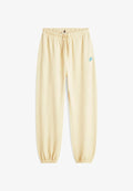 Tommy Hilfiger LOGO EMBROIDERY CUFFED LEG JOGGERS - Tracksuit bottoms - country ivory