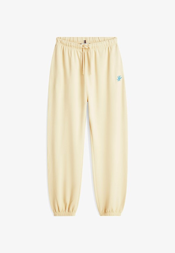 Tommy Hilfiger LOGO EMBROIDERY CUFFED LEG JOGGERS - Tracksuit bottoms - country ivory