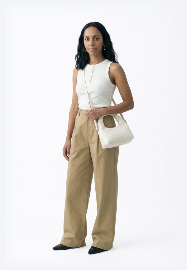 Calvin Klein EMBLEM PUFFER BAG WITH STRAP - Cross body bag - white