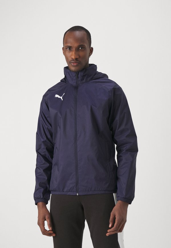 Puma TEAMGOAL ALL WEATHER  - Waterproof jacket - navy/white