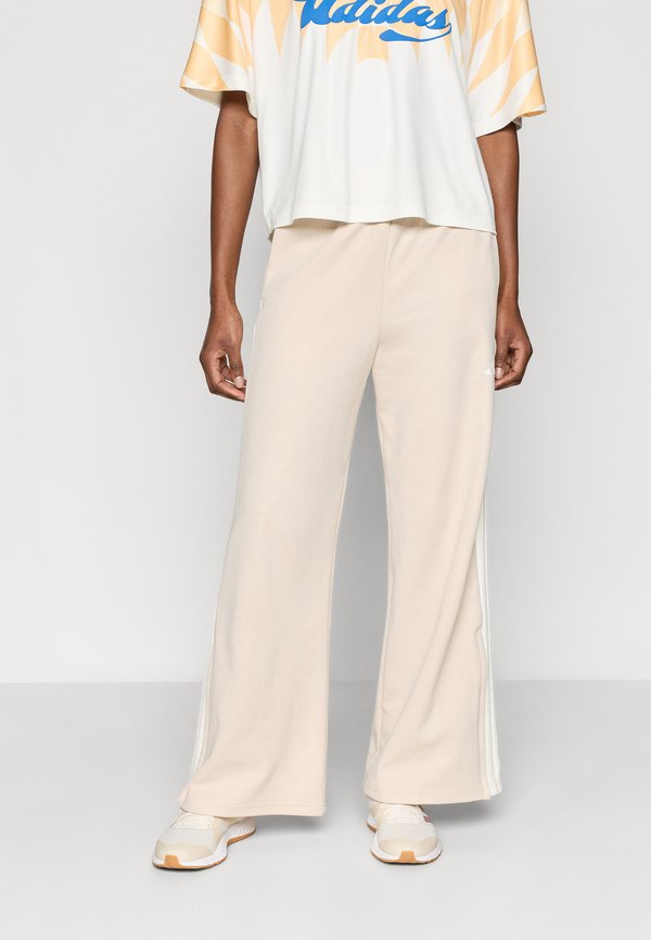 adidas Sportswear HOUSE OF TIRO WIDE LEG - Tracksuit bottoms - crystal linen/off white