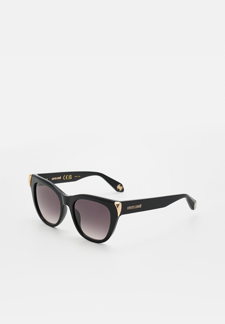 Schwarze Cat-Eye-Sonnenbrille mit verlaufenden dunklen Gläsern, goldenen Eckakzenten und Roberto Cavalli-Logo an den Bügeln.