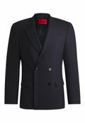 Marineblaues Doppelreiher-Blazer mit spitzen Revers, schwarzen Knöpfen und seitlichen Taschen. Der gefütterte Innenraum verfügt über ein sichtbares Markenetikett. Taillierte Passform.