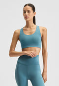 New Balance NB DEFINE TRAIN BRA - Medium support sports bra - big teal