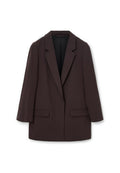 Brauner übergroßer Blazer mit Schalkragen, zwei vorderen Taschen und glatter Textur, ausgestattet mit einem Ein-Knopf-Verschluss und lässiger Silhouette.