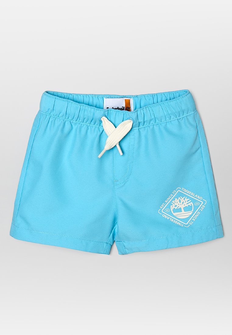 Hellblaue Kinder-Shorts mit elastischem Bund und weißem Kordelzug, mit weißem Timberland-Logo am linken Bein.