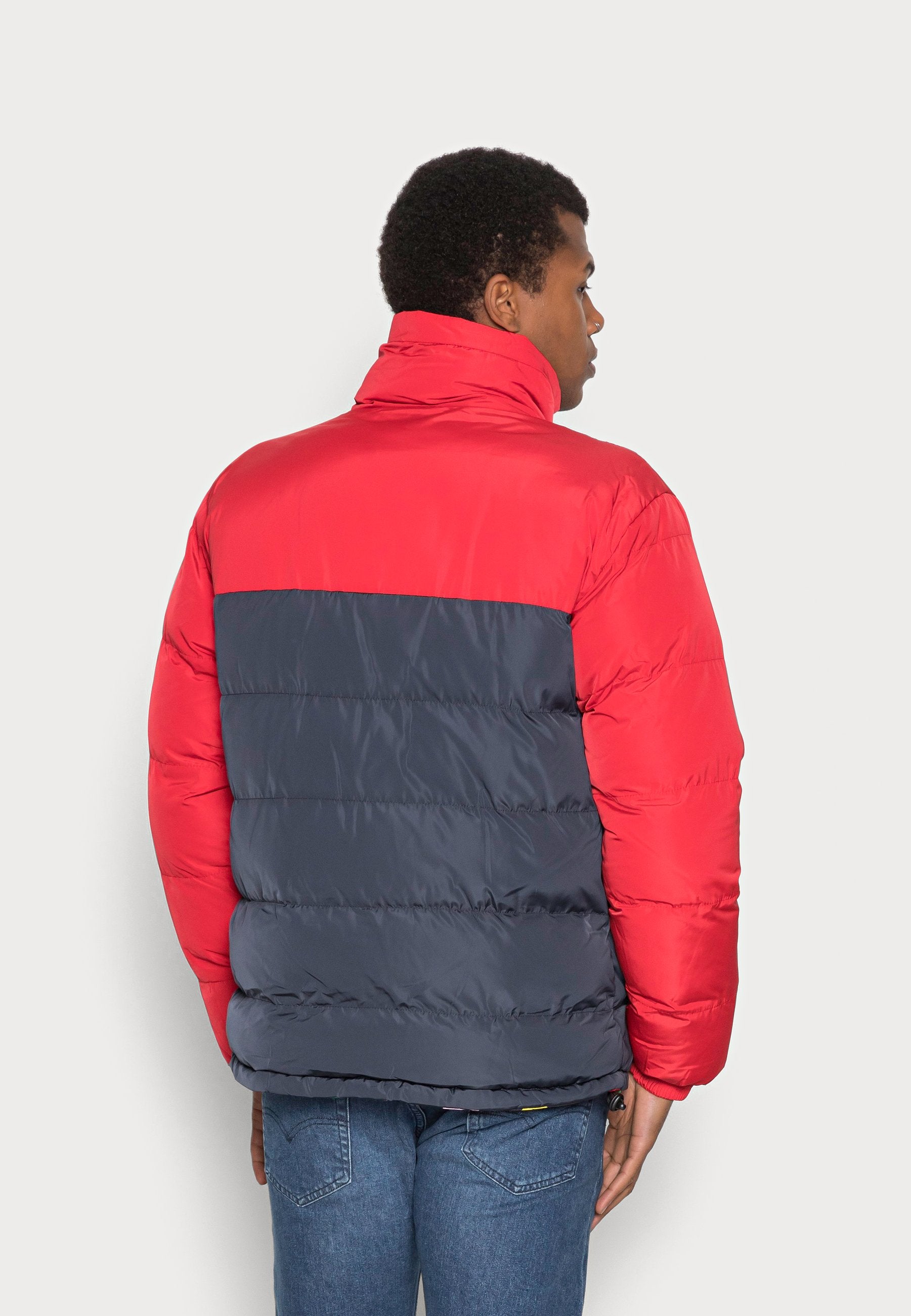 Karl Kani UNISEX RETRO REVERSIBLE BLOCK PUFFER JACKET RED