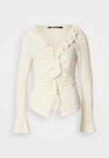 Cremfarbene Bluse mit langen Ärmeln, V-Ausschnitt, Rüschendetail, geraffter Seite und Glockenärmel. Hergestellt aus leichtem, strukturiertem Stoff.