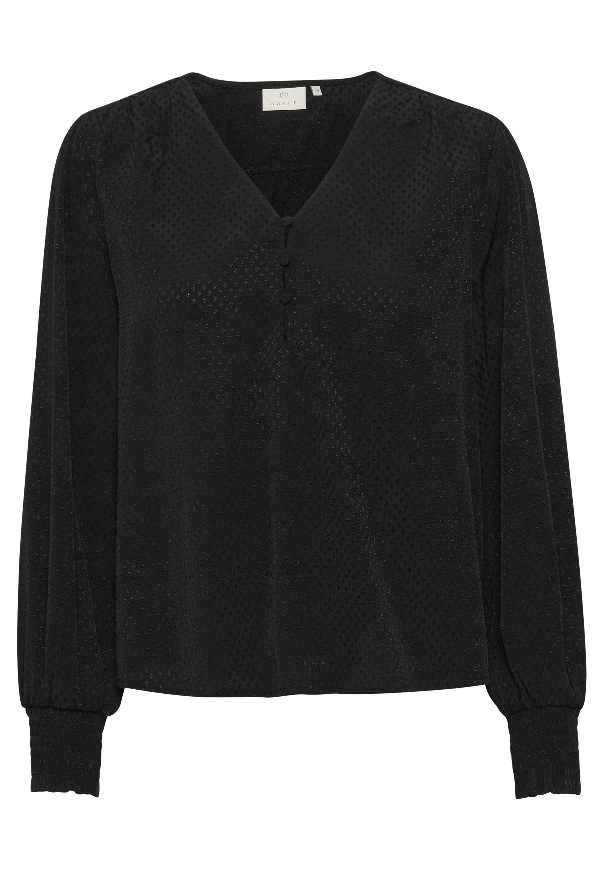 Schwarze Bluse mit langen Puffärmeln, V-Ausschnitt, drei-Knopf-Detail vorne und strukturiertem Stoff mit kleinen Punktmustern.