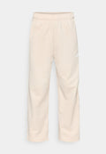 adidas Sportswear HOUSE OF TIRO WIDE LEG - Tracksuit bottoms - crystal linen/off white
