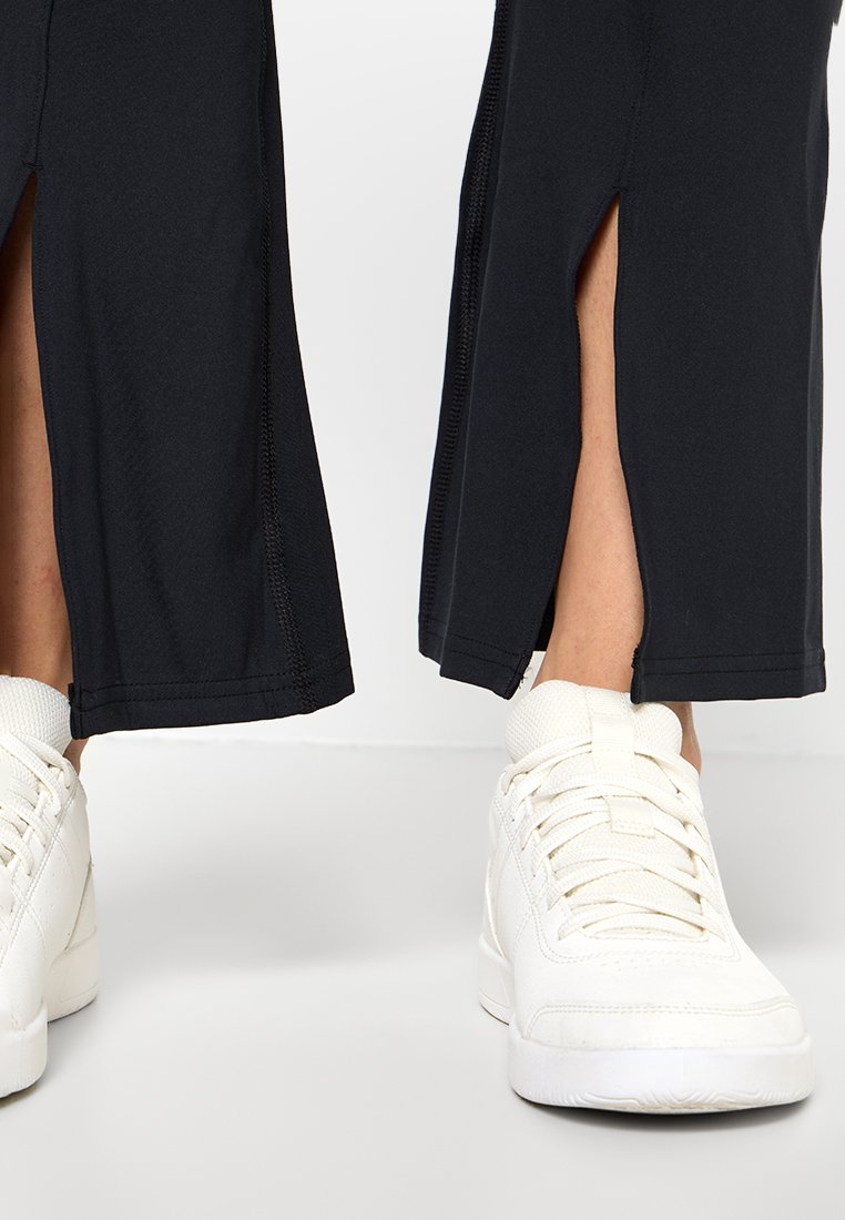 Under Armour MERIDIAN KICK FLARE PANT-GRN