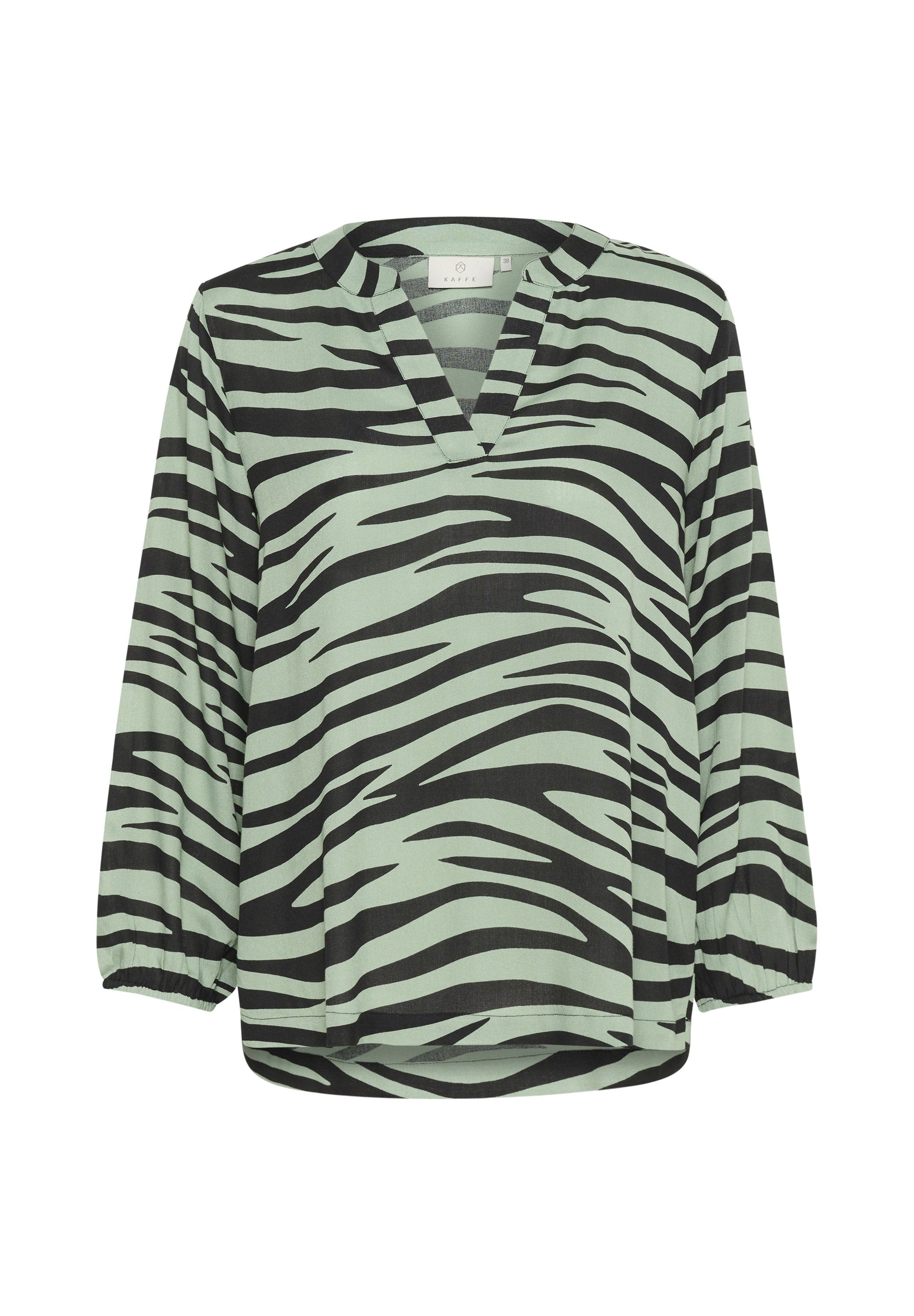 Helles grünes Bluse mit schwarzen Tigerstreifen, mit V-Ausschnitt und 3/4-Ärmeln. Hergestellt aus weichem Stoff mit lockerer Passform.