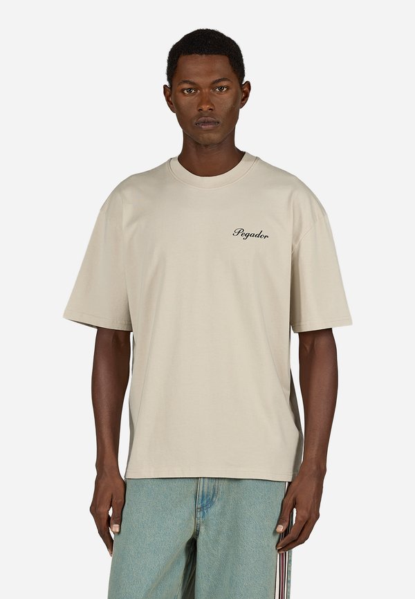 Pegador NOTO TEE