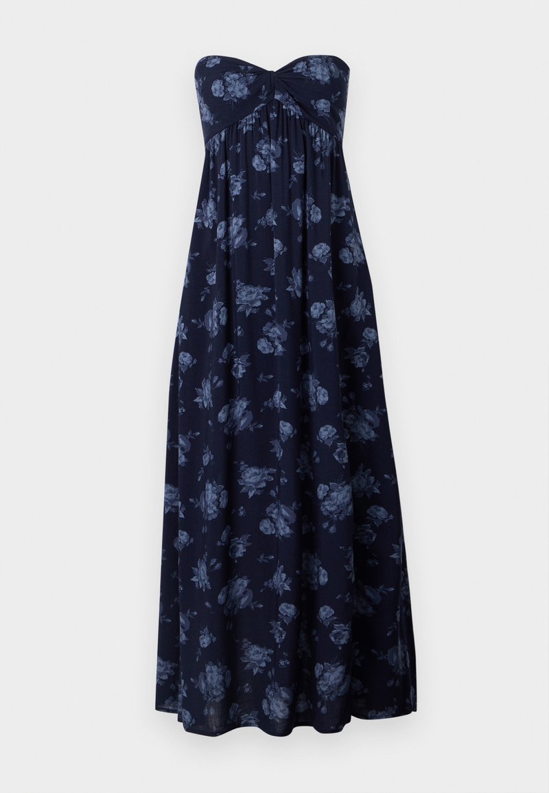 Trägerloses Maxikleid in Marineblau mit blauem Blumenmuster, mit gerafftem Brustbereich und fließender Silhouette. Weicher Stoff mit glatter Textur.